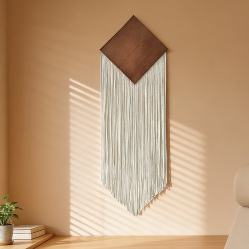 Diamond macramé wall hanging detail — geometric diamond knot pattern in natural cotton