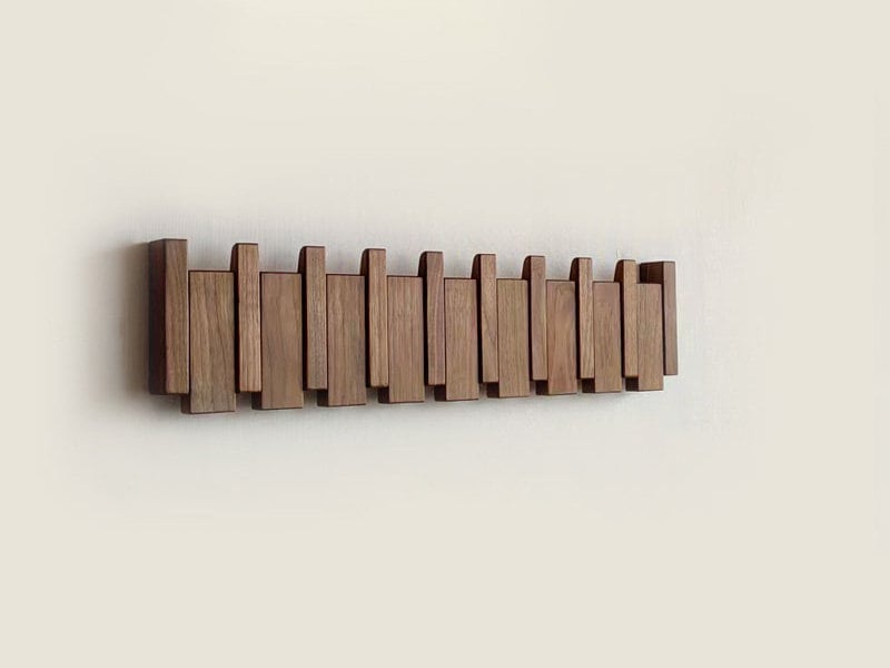Piano key wooden coat rack full product view — wall-mounted storage in Japandi style